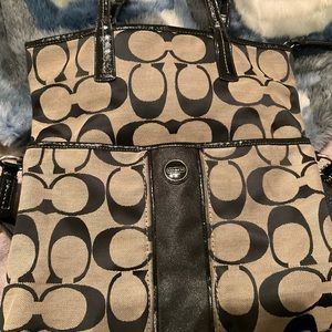 Signature black and gray bag! See photos of strap handle sign of wear. Great bag